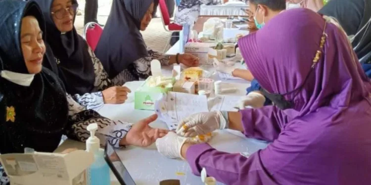Puskesmas Pagedangan Deteksi Dini PTM Bagi Guru dan Warga