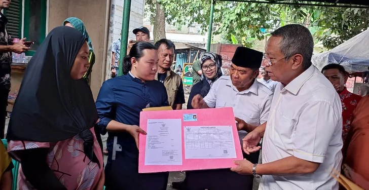 Pj Gubernur Banten Kunjungi Keluarga Petugas KPPS di Tangerang Selatan Yang Meninggal Dunia
