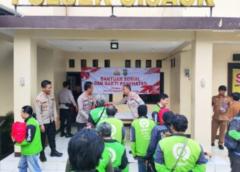 Polsek Cisauk Berikan Layanan Kesehatan Gratis dan Bantuan Sosial untuk Komunitas Ojol