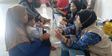 PMI Tangsel Salurkan Layanan Kesehatan Gratis dan Air Bersih bagi Warga Terdampak TPA Cipeucang
